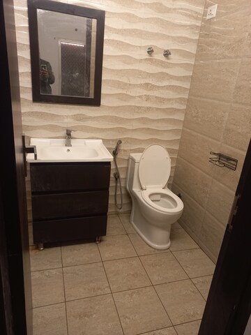 Bathroom in 4 BHK Apartment at Elite Golf Green, Sector 79 – for Sale