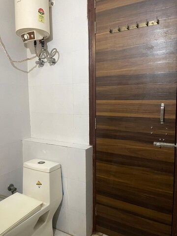 Bathroom in 3 BHK Builder Floor at Palam Vyapar Kendra, Sector 2 – for Sale