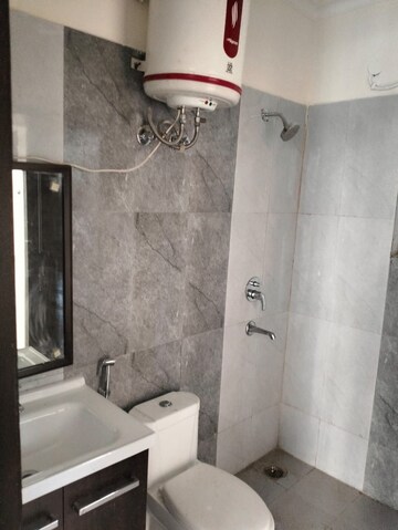 Bathroom in 3 BHK Builder Floor at Ansal API Esencia, Sector 67 – for Sale