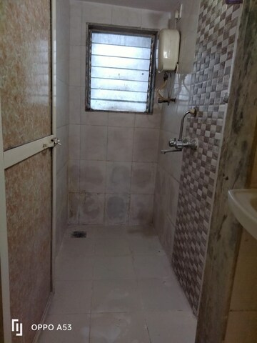 Bathroom in 1 BHK Apartment at Vaishnavi Ganesh Nagar CHS, Virar East – for Sale