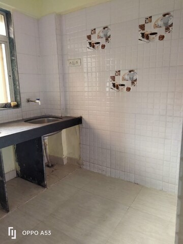 Kitchen in 1 BHK Apartment at Vaishnavi Ganesh Nagar CHS, Virar East – for Sale