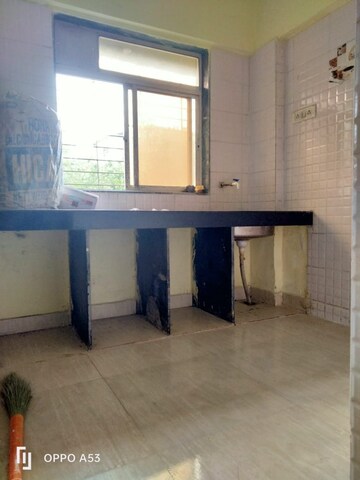 Kitchen in 1 BHK Apartment at Vaishnavi Ganesh Nagar CHS, Virar East – for Sale