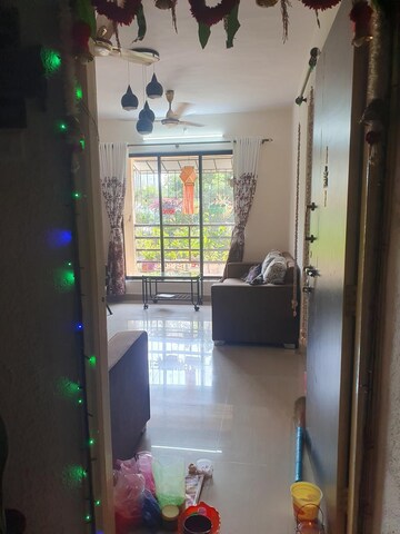 Living Room in 2 BHK Apartment at Kavya Hill View CHS, Anand Nagar – for Sale