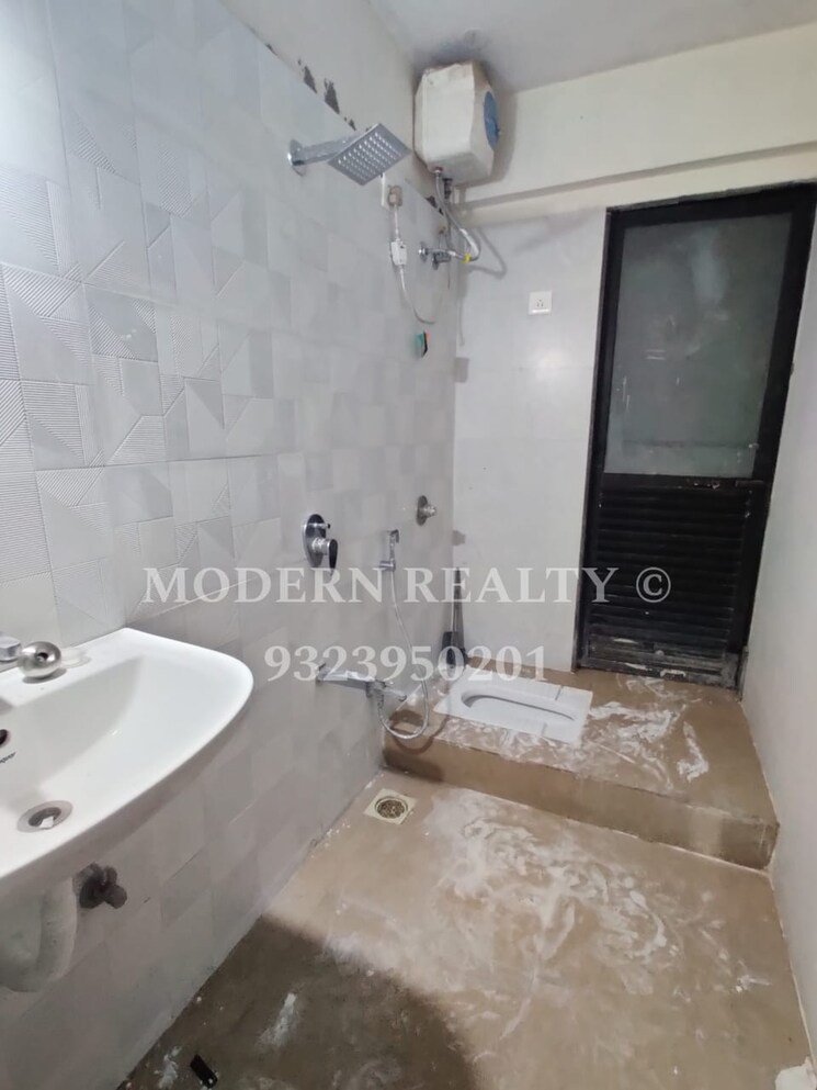 Bathroom, dosti-planet-north-emerald 2 Bedroom 1050 Sq.Ft. Apartment In Shilphata Thane 7361518