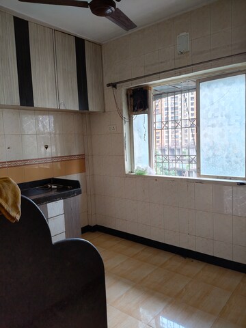 Kitchen in 1 RK Apartment at Vasant Valley Complex, Malad East – for Sale