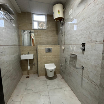 Bathroom in 2 BHK Apartment at Signature Global Orchard Avenue, Sector 93 – for Sale