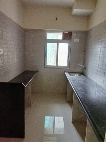 Kitchen in 2 BHK Apartment at Vihang Valley Phase 3, Kasarvadavali – for Sale