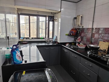 Kitchen in 3 BHK Apartment at Belscot Chs Ltd, Andheri West – for Sale