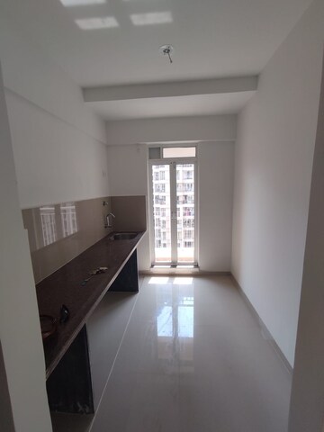 Kitchen in 2 BHK Apartment at Triveni Vasant Vihar CHS, Vasant Vihar – for Sale