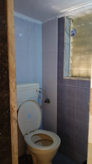 Bathroom in 1 BHK Apartment at MAAD Nakoda Heights, Nalasopara West – for Sale