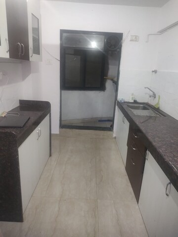 Kitchen in 1 BHK Apartment at Raj Mandir Complex, Mira Road – for Sale