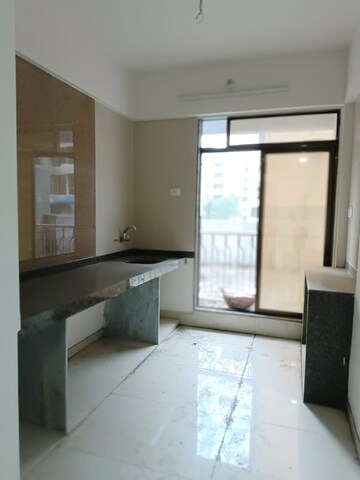 Kitchen in 1 BHK Apartment at Shubh Mangalam, Katrap – for Sale