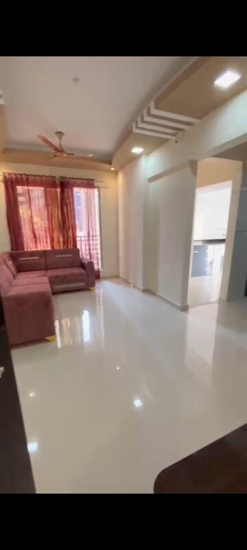 Living Room in 1 BHK Apartment at Shubh Mangalam, Katrap – for Sale