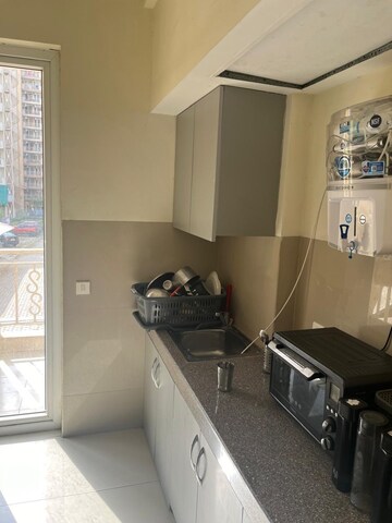 Kitchen in 3 BHK Apartment at Emaar Palm Gardens, Sector 83 – for Sale