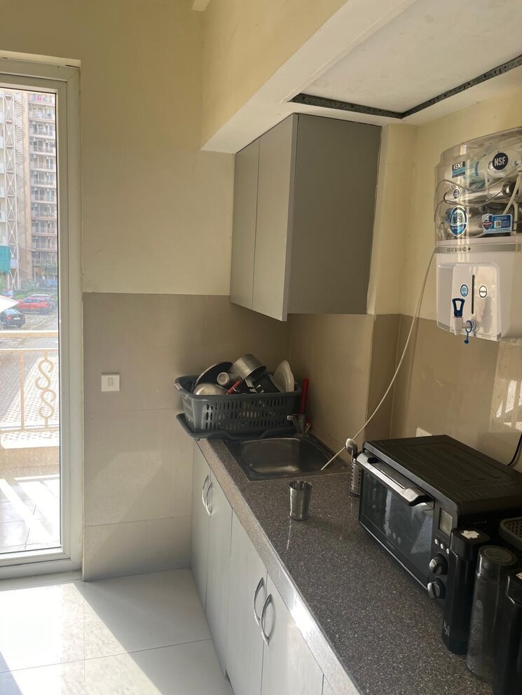 Kitchen, emaar-palm-gardens 3 Bedroom 1900 Sq.Ft. Apartment In Sector 83 Gurgaon 7370372