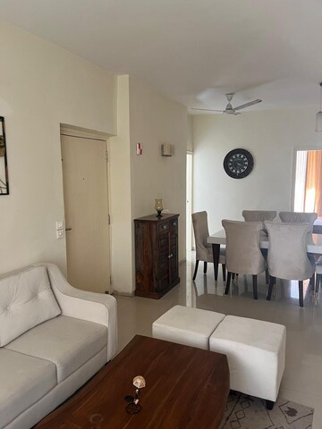 Living Room in 3 BHK Apartment at Emaar Palm Gardens, Sector 83 – for Sale