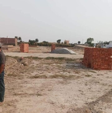 Plot Area in  Plot at Bhopani Village – for Sale