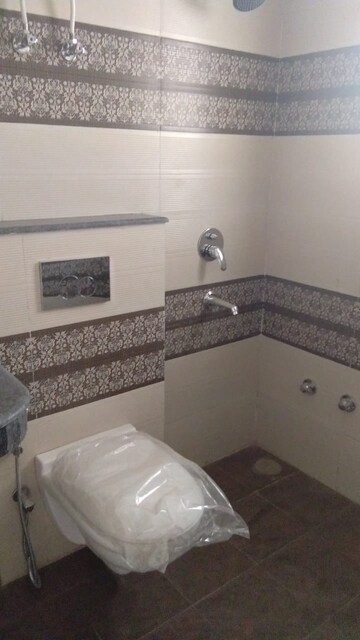 Bathroom in 3 BHK Builder Floor at Mahavir Enclave – for Sale