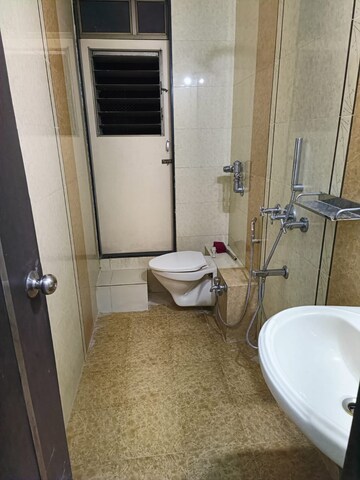 Bathroom in 2 BHK Apartment at Hyde Park Galaxy, Manpada – for Sale