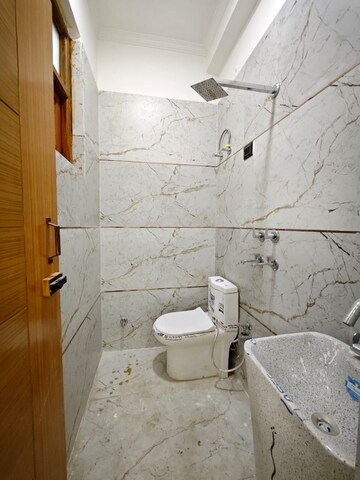 Bathroom in 4 BHK Builder Floor at Ahinsa Khand ii – for Sale