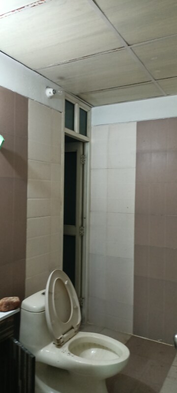 Bathroom in 2.5 BHK Apartment at Panchsheel Wellington, Sain Vihar – for Sale