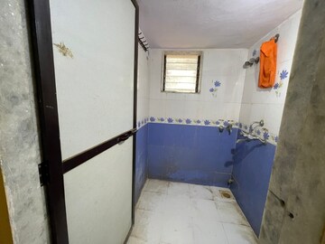 Bathroom in 1 BHK Apartment at Alaknanda CHS, Dahisar East – for Sale