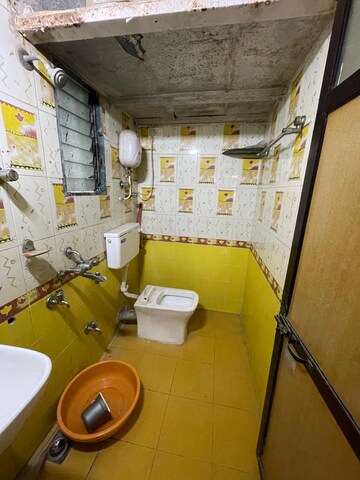 Bathroom in 2 BHK Apartment at Shree Suryodaya CHS, Dahisar East – for Sale