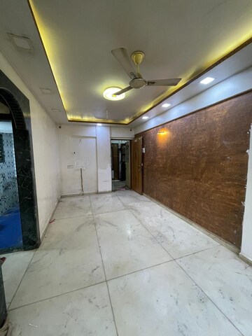 Living Room in 2 BHK Apartment at Shree Suryodaya CHS, Dahisar East – for Sale