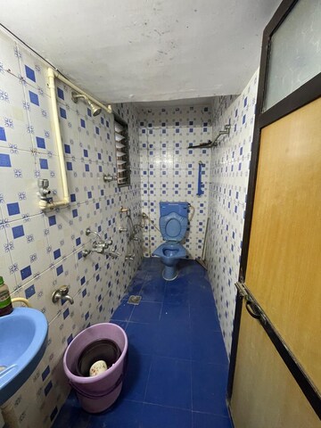 Attached Bathroom in 2 BHK Apartment at Shree Suryodaya CHS, Dahisar East – for Sale