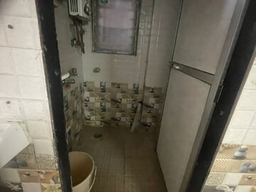 Bathroom in 1 BHK Apartment at Suvarnadurg CHS, Borivali East – for Sale