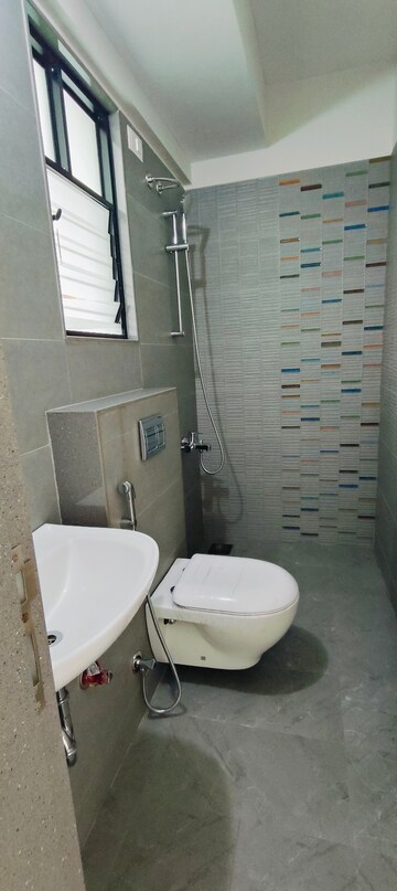 Bathroom in 2 BHK Apartment at Magarpatta Riverview City Hornbill Heights, Loni Kalbhor – for Sale