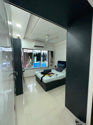 Bedroom in 3 BHK Apartment at Om Dronagiri CHS, Borivali East – for Sale