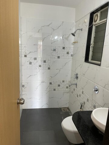 Bathroom in 2 BHK Apartment at Sukhwani Dynasty, Wakad – for Rent