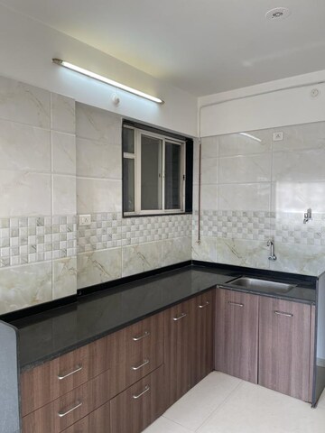 Kitchen in 2 BHK Apartment at Sukhwani Dynasty, Wakad – for Rent