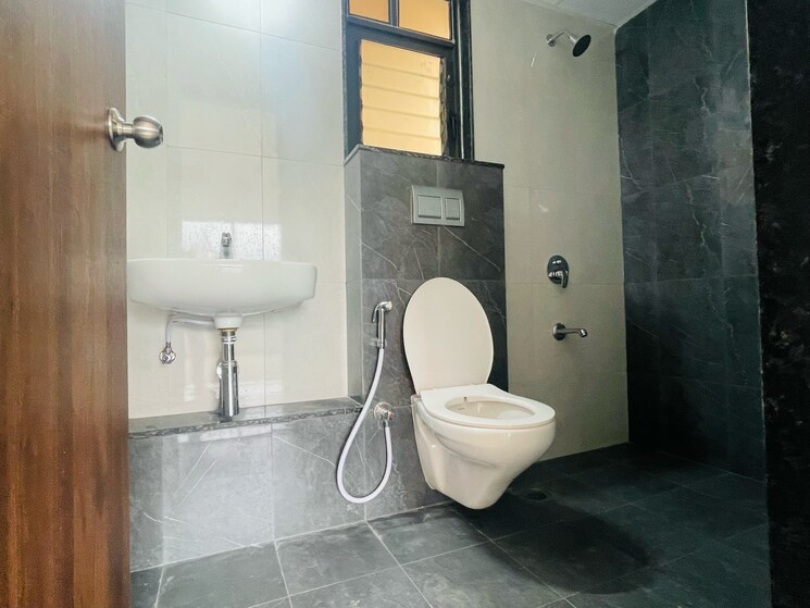Bathroom, kumar-park-infinia 2 Bedroom 838 Sq.Ft. Apartment In Bhekrai Nagar Pune 7375826