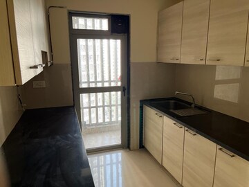 Kitchen in 2 BHK Apartment at Lodha Luxuria Priva, Majiwada – for Sale