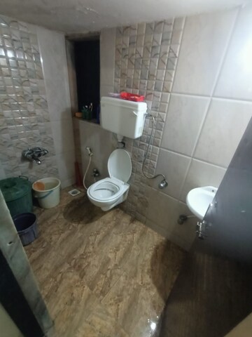 Bathroom in 2 BHK Apartment at New Home Paradise Apartment, Virar West – for Sale