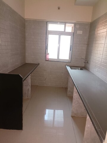 Kitchen in 2 BHK Apartment at Vihang Valley Phase 3, Kasarvadavali – for Sale