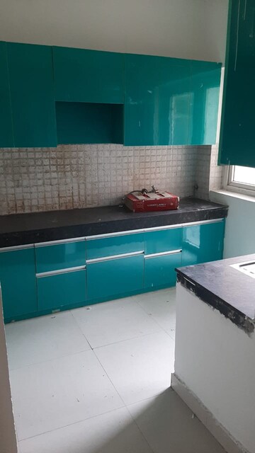 Kitchen in 3 BHK Apartment at AFOWO Raksha Addela, Sector 16c Greater Noida – for Sale