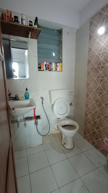Bathroom in 2 BHK Apartment at Tanvi Eminence, Mira Road – for Sale
