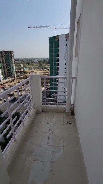 Balcony in 2 BHK Apartment at Urban Axis Urban Woods, Sushant Golf City – for Sale