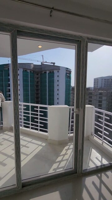 Balcony in 2 BHK Apartment at Urban Axis Urban Woods, Sushant Golf City – for Sale