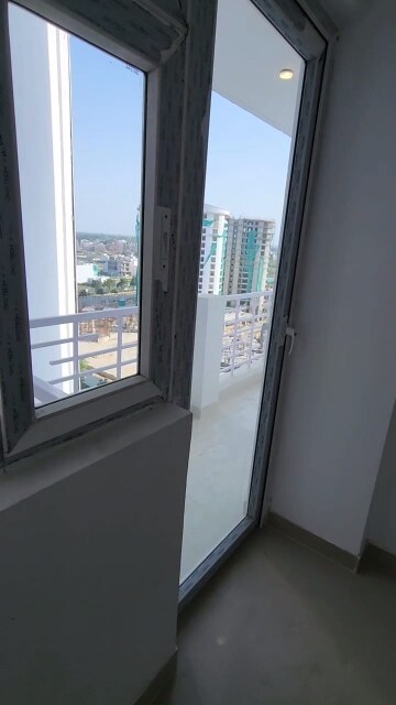Balcony in 2 BHK Apartment at Urban Axis Urban Woods, Sushant Golf City – for Sale