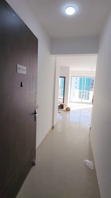 Building Lobby in 2 BHK Apartment at Urban Axis Urban Woods, Sushant Golf City – for Sale