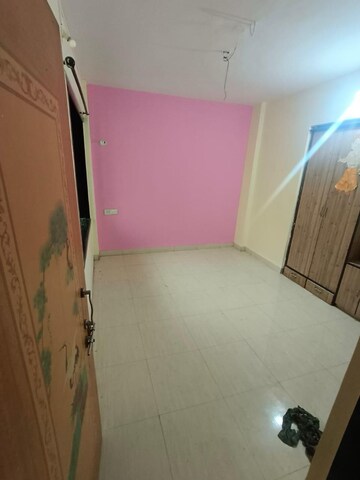 Room in 2 BHK Apartment at Nilkanth Park CHS, Wayle Nagar – for Sale