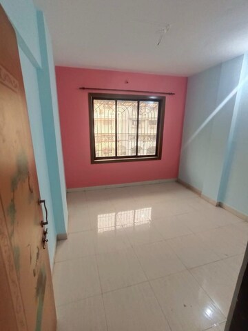 Room in 2 BHK Apartment at Nilkanth Park CHS, Wayle Nagar – for Sale