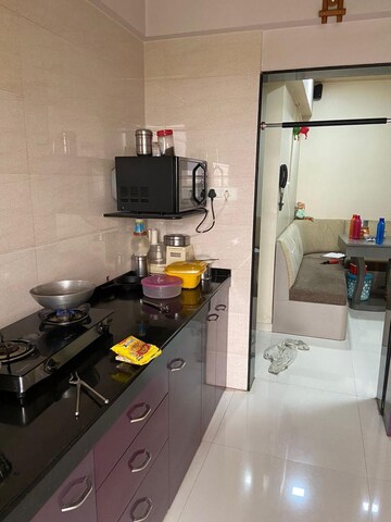 Kitchen in 2 BHK Apartment at Velocity Hill Spring, Ghodbunder Road – for Sale