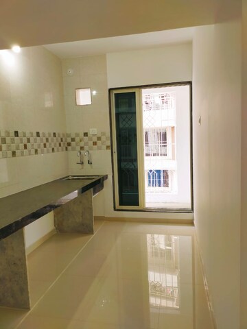 Living Room in 2 BHK Apartment at Metro Aangan, Badlapur East – for Sale