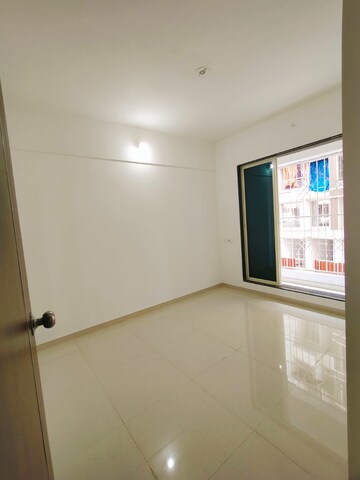 Room in 2 BHK Apartment at Metro Aangan, Badlapur East – for Sale