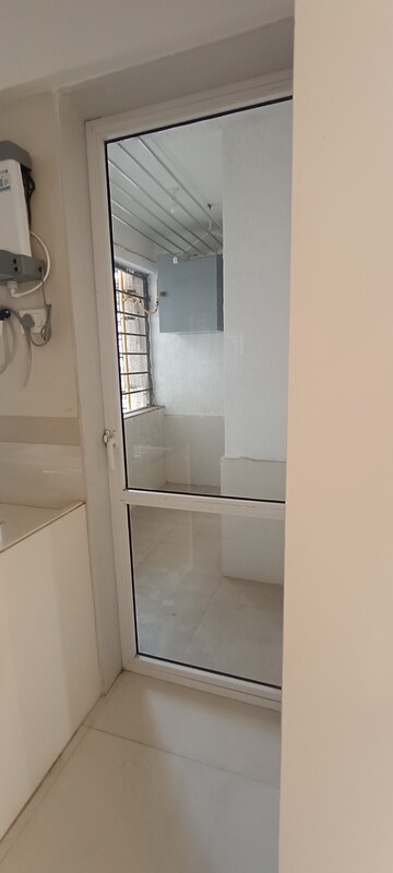 Kitchen in 3 BHK Apartment at Soham Crystal Spires, Ghodbunder Road – for Sale